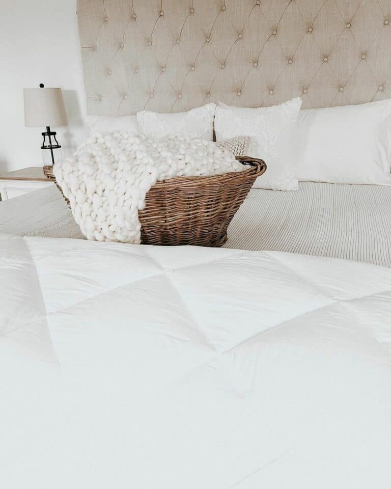 White Bed With Woven Basket Décor