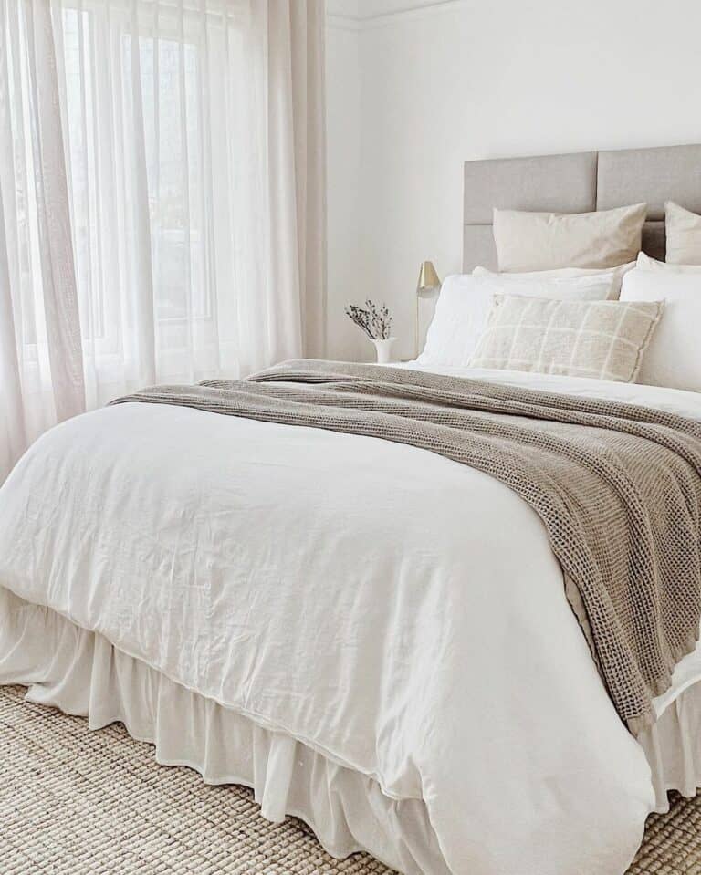 White Bedroom With Sheer Beige Curtains