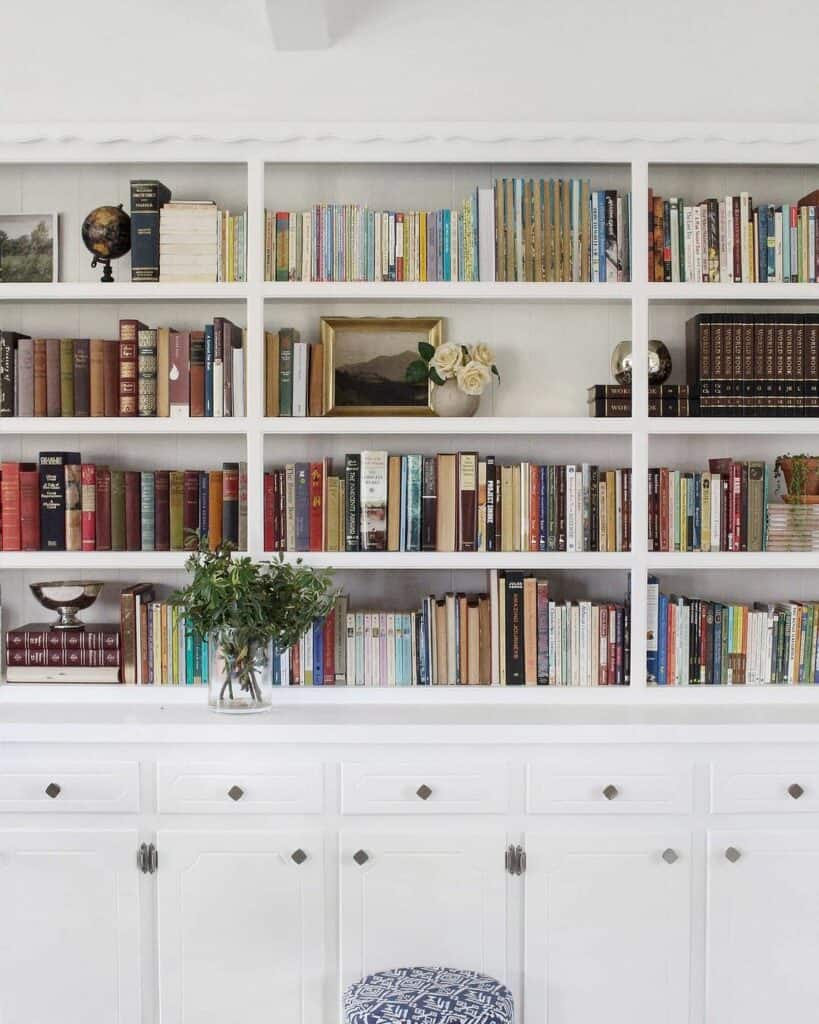 White Built-in Bookcase With Lower Cabinetry