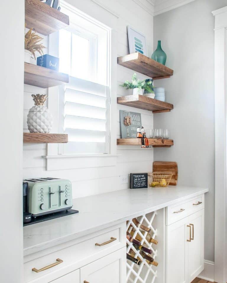 White Farmhouse Kitchen With Wooden Shelves