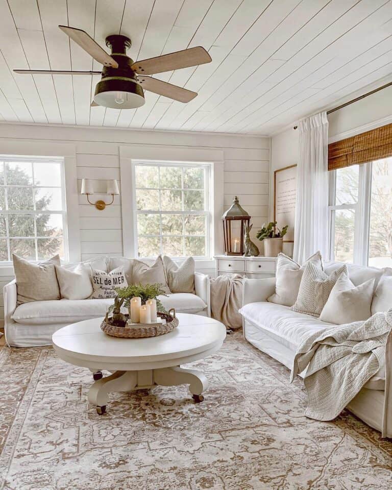 White Farmhouse Living Room With Two Matching Sofas