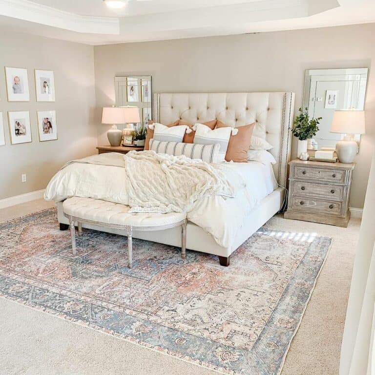 White French Upholstered Bed Centered in an Open Bedroom