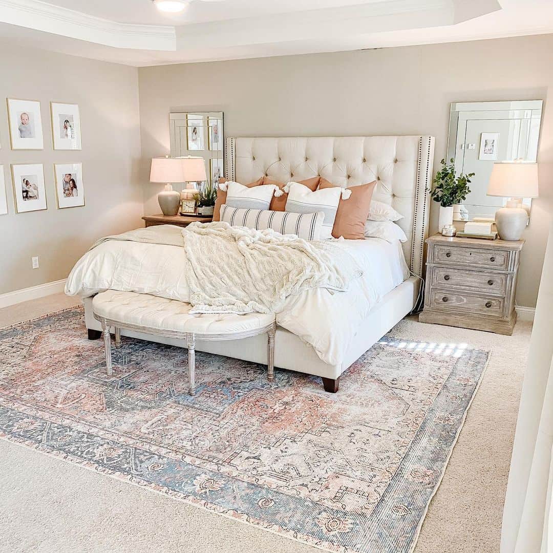 White French Upholstered Bed Centered in an Open Bedroom - Soul & Lane