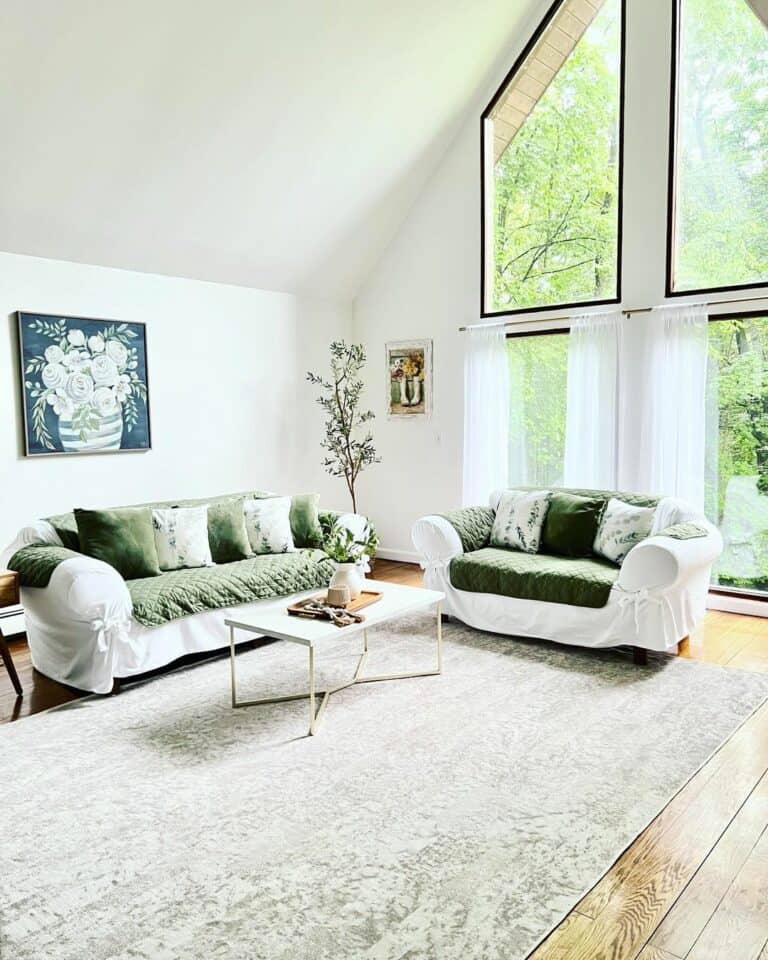 White Living Room Sofas With Green Accents