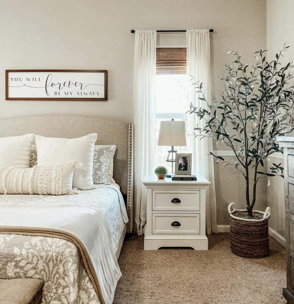 White Nightstand Perched on Taupe Carpet