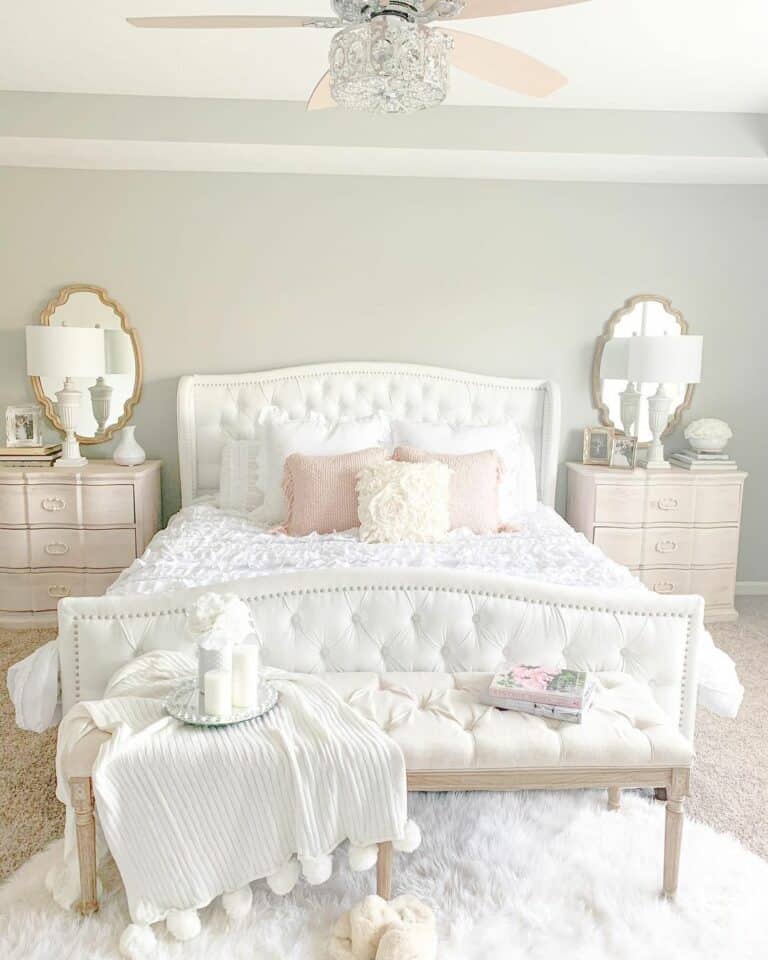 White Tufted Bed With Pink Throw Pillows