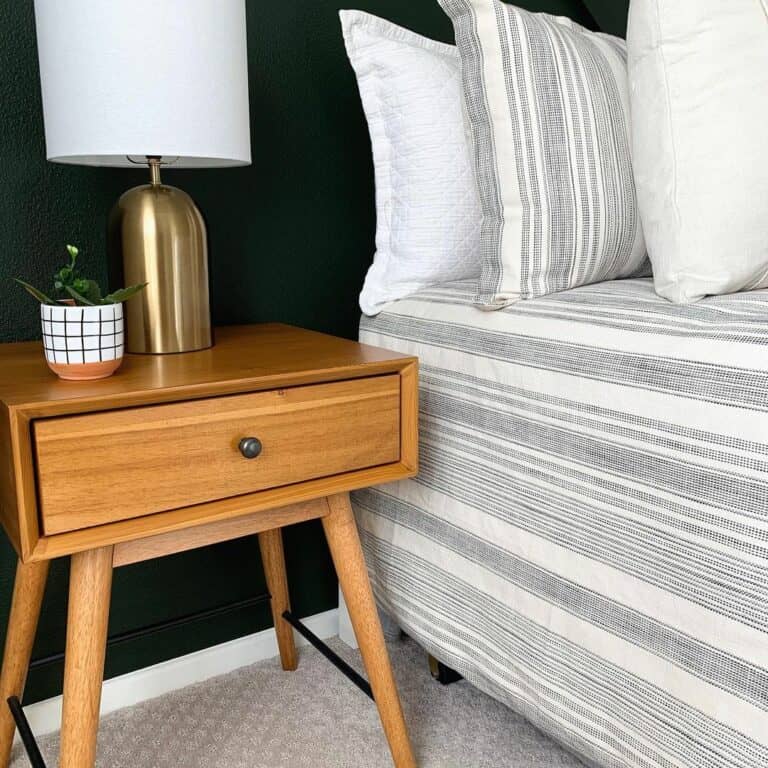 Wood Nightstand Against a Black Wall