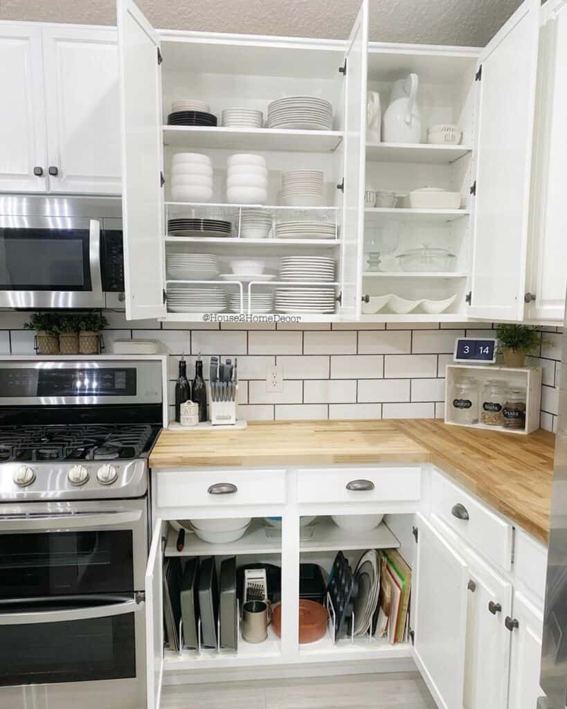 Wood and White Kitchen With Organized Cabinets