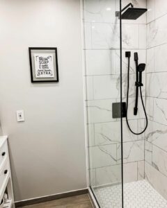 Monochromatic Walk-in Shower With Hexagonal Flooring