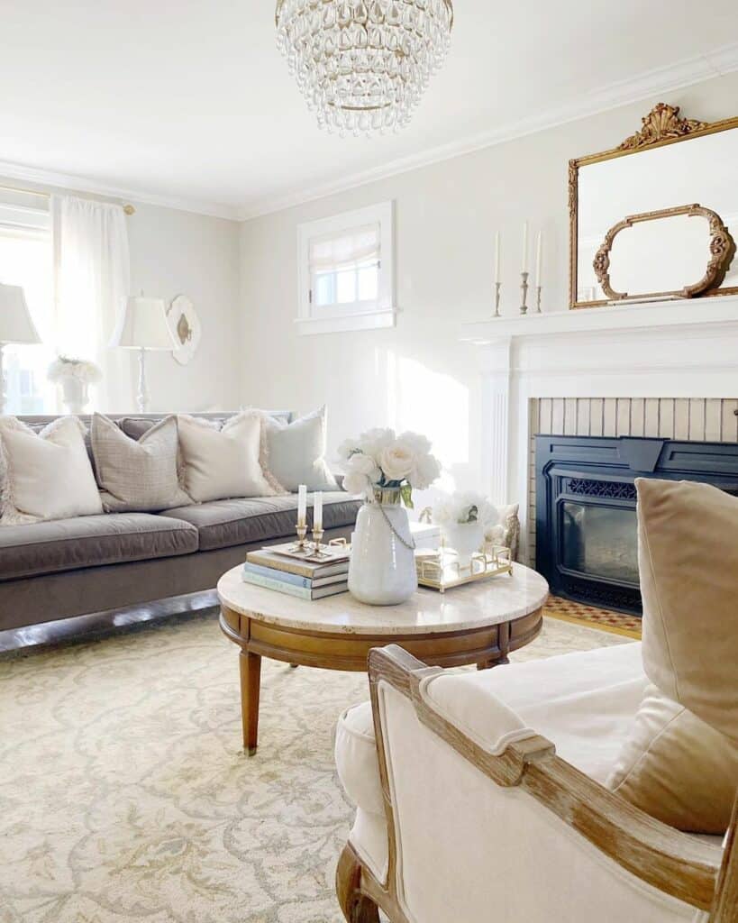 Layered Brass Mirrors Accessorize a Fireplace