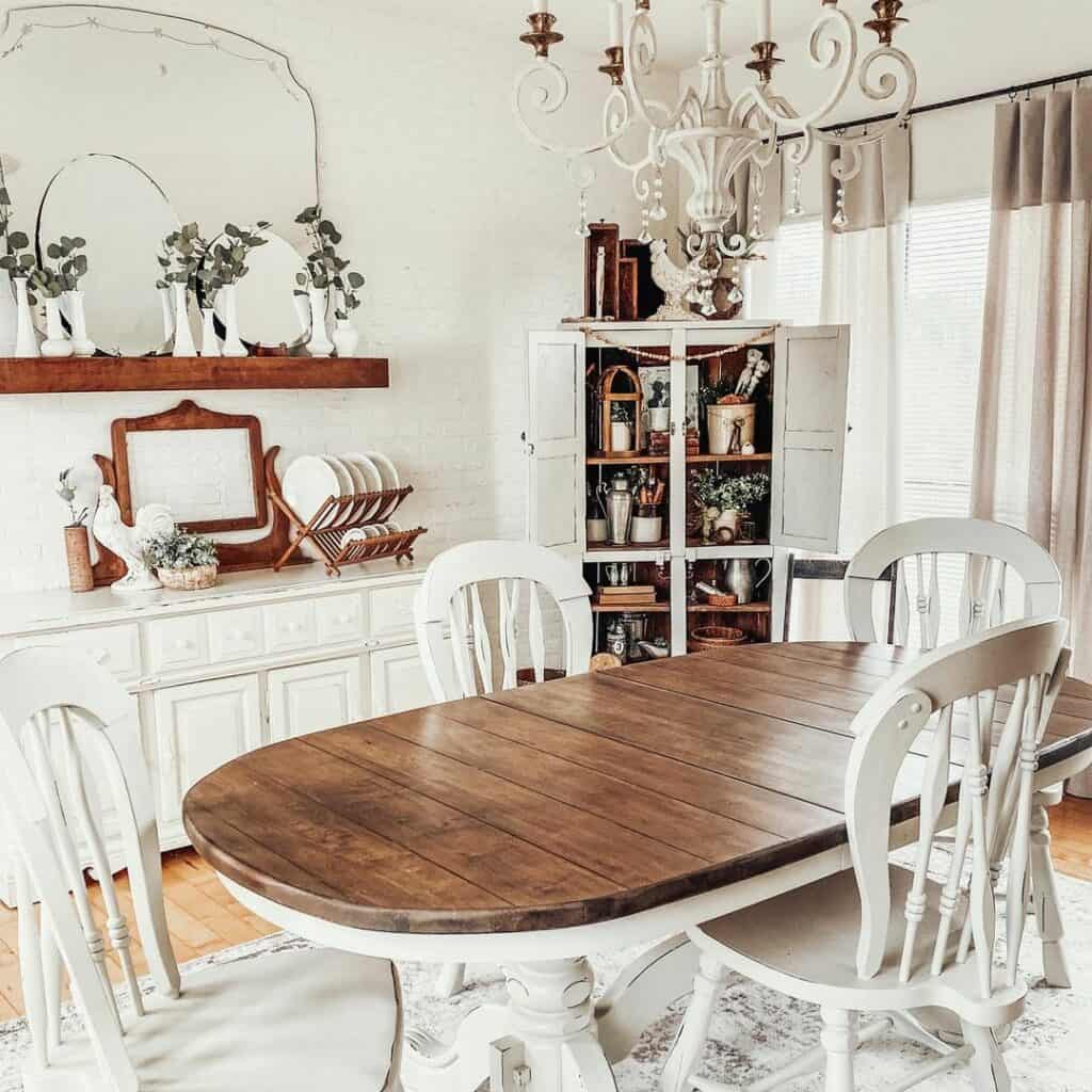 Dining Area With White and Wooden Accents
