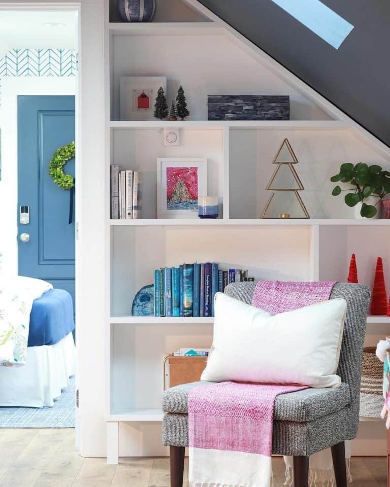 Attic Bedroom With White Library Shelves
