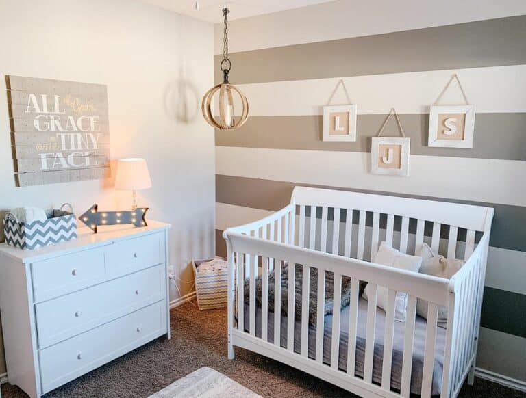 Baby Room With Striped Accent Wall