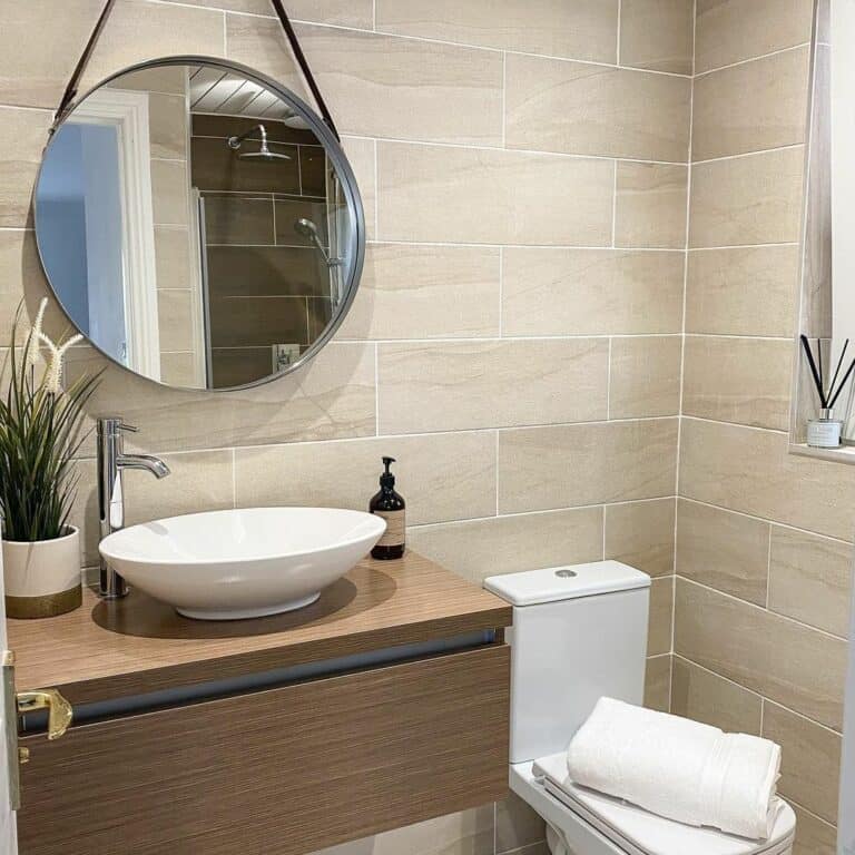 Bathroom Wall With Beige Staggered Tiles
