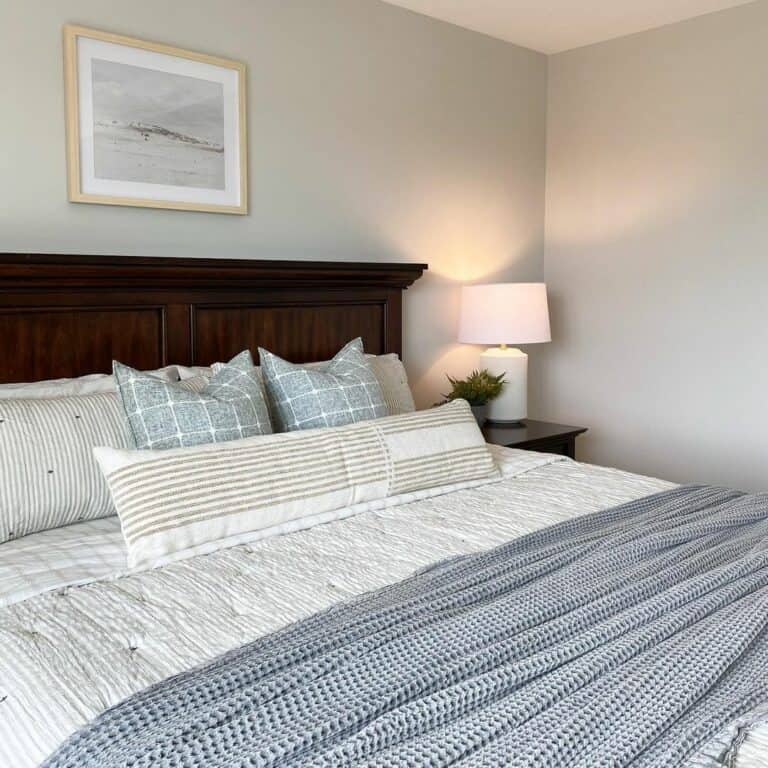 Bedroom With Dark Stained Wood Bed