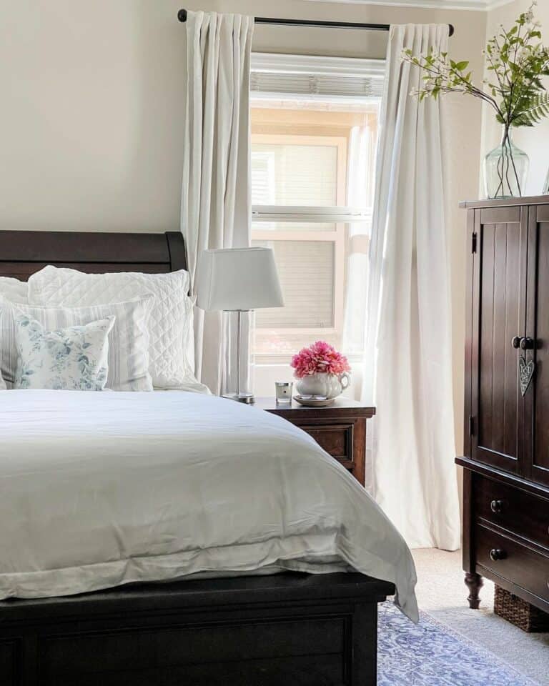 Bedroom With Dark Stained Wood Furniture