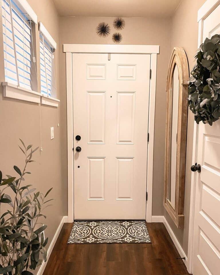 Beige Entryway With White Door