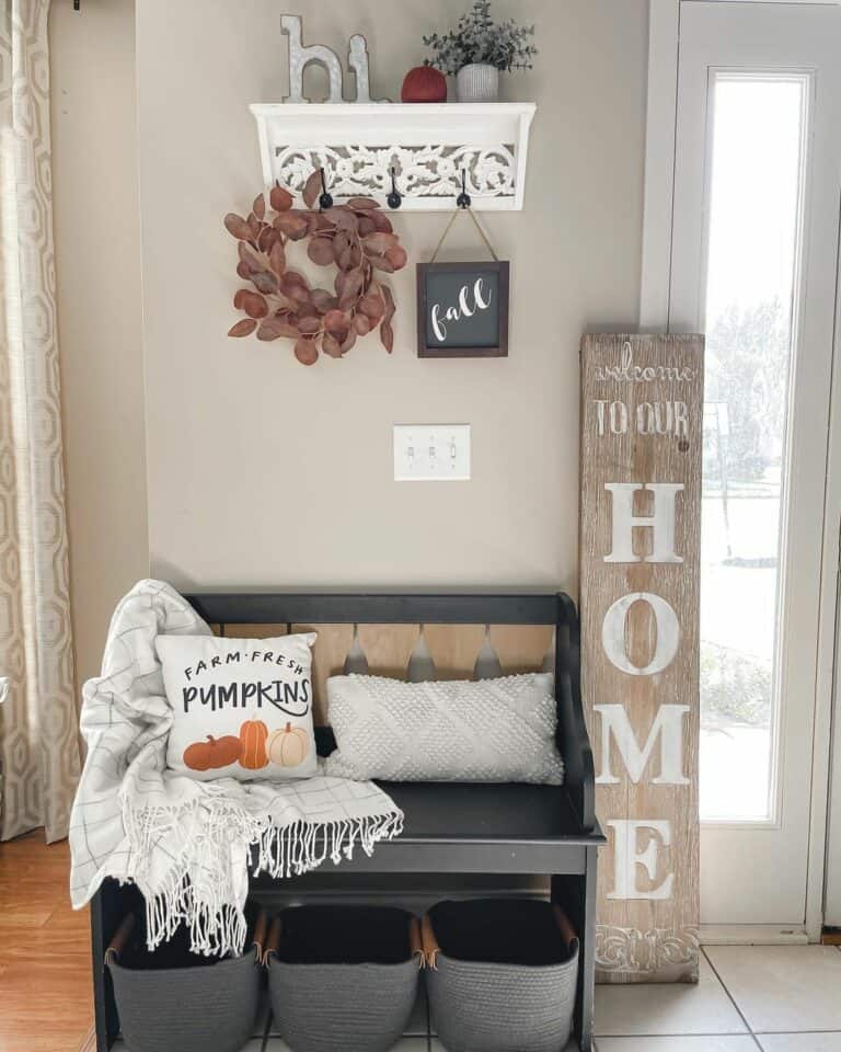 Black Bench With Wood Entryway Sign