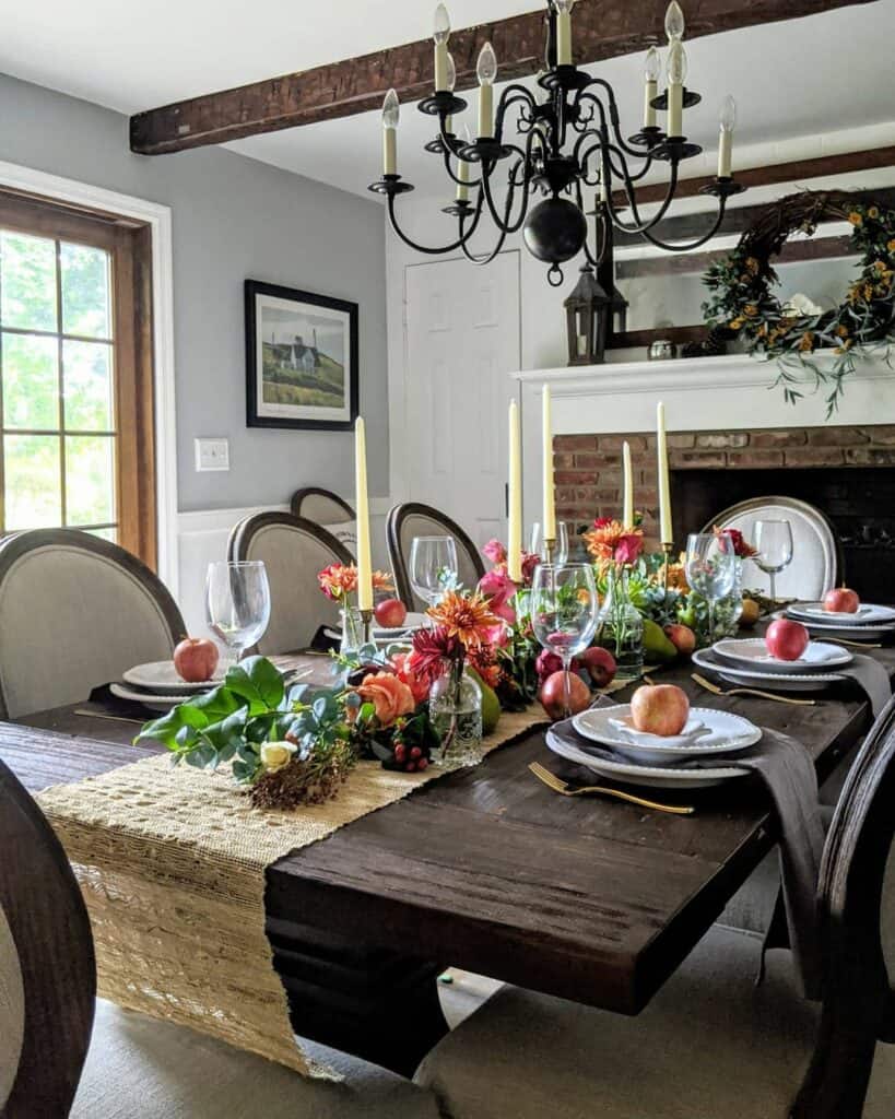 Black Chandelier Over Floral Centerpiece