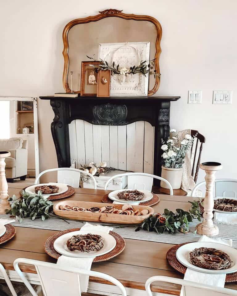 Black Mantel Hosts Antique Mirror