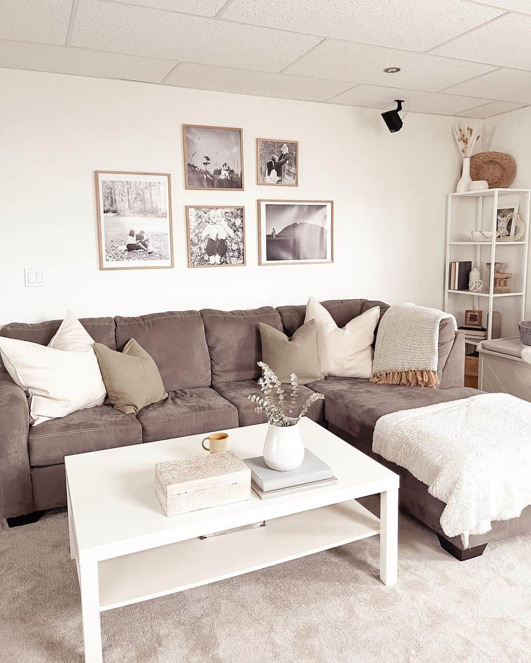 Black-and-White-Gallery-Wall-Layout-for-a-Living-Area.jpg