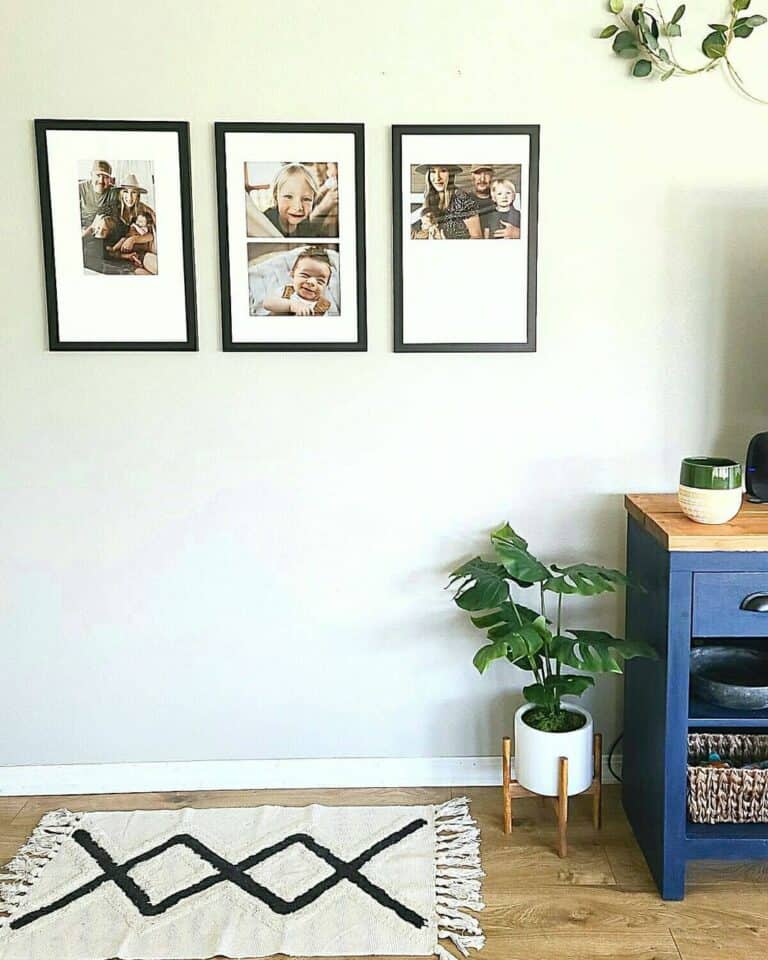 Black-framed Family Portraits in Simple Farmhouse Room