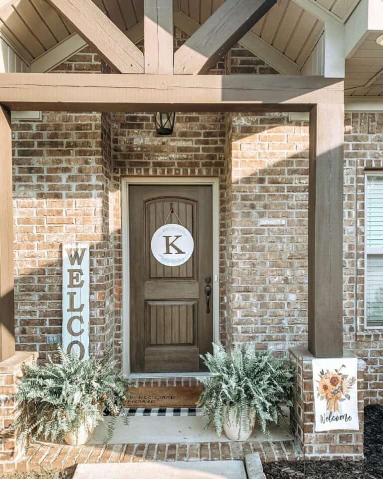 Brick Front Porch With Welcome Signs