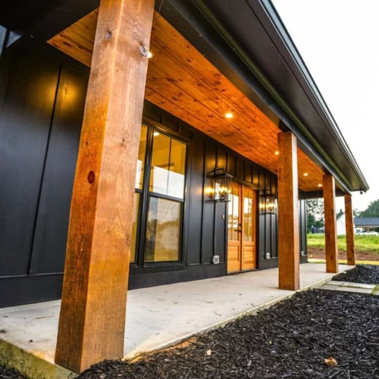 Charcoal Walls With Teak Bead Board Walls in Farmhouse Home