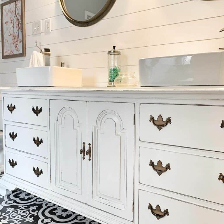 Cottage Bathroom With White Cabinets