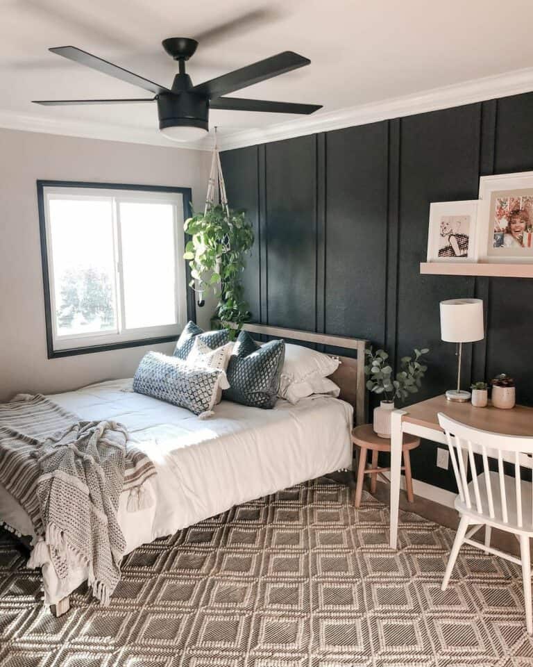 Cozy Bedroom With Black Paneled Accent Wall