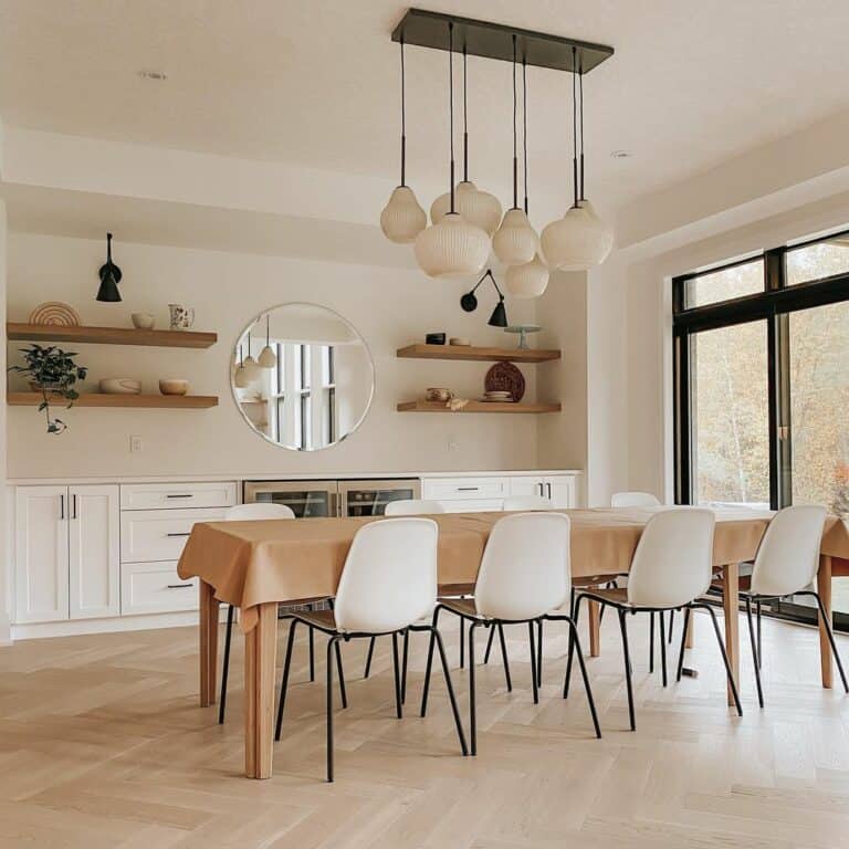 Cream Walls and Natural Wood Flooring in Spacious Dining Room