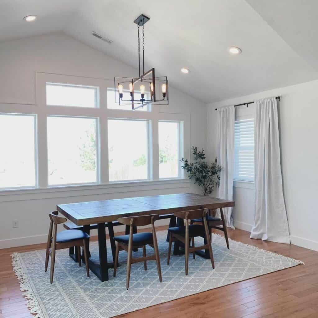 Dining Room With Stained Wood Farmhouse Table