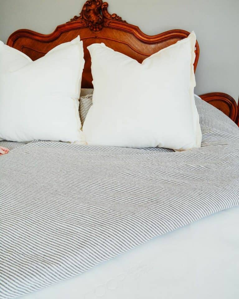 Embellished Wood Headboard and Striped Comforter