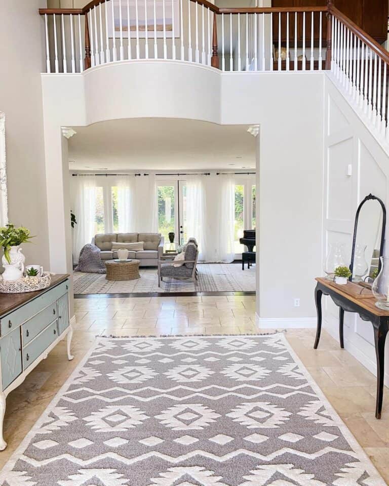 Entrance Hall With Gray and White Area Rug