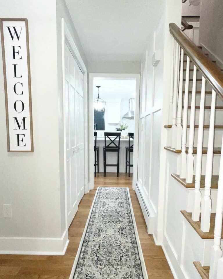 Entrance Hallway With Wood Frame Welcome Sign