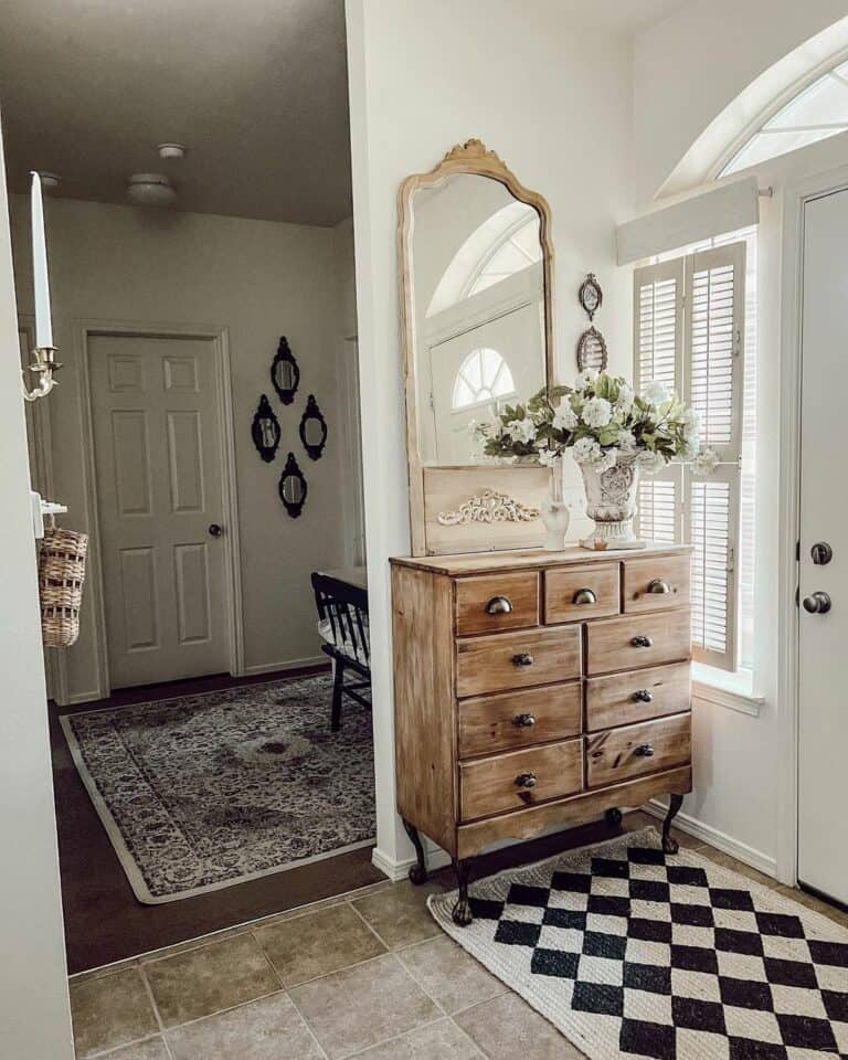 Entryway Foyer With Stained Wood Dresser