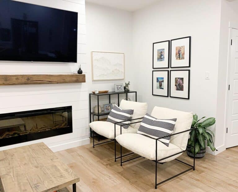 Family Portraits on Wall in Farmhouse Living Room