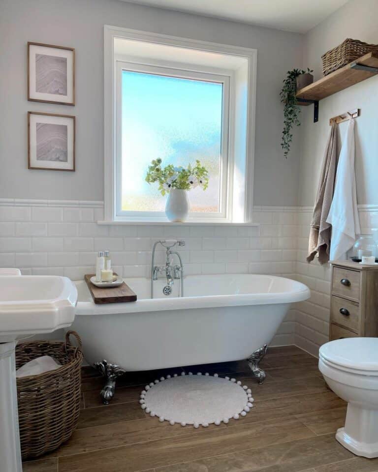 Farmhouse Bathroom With White Bathtub