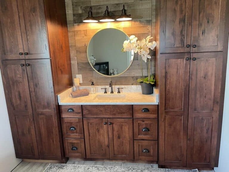 Farmhouse Bathroom With Wooden Cabinets