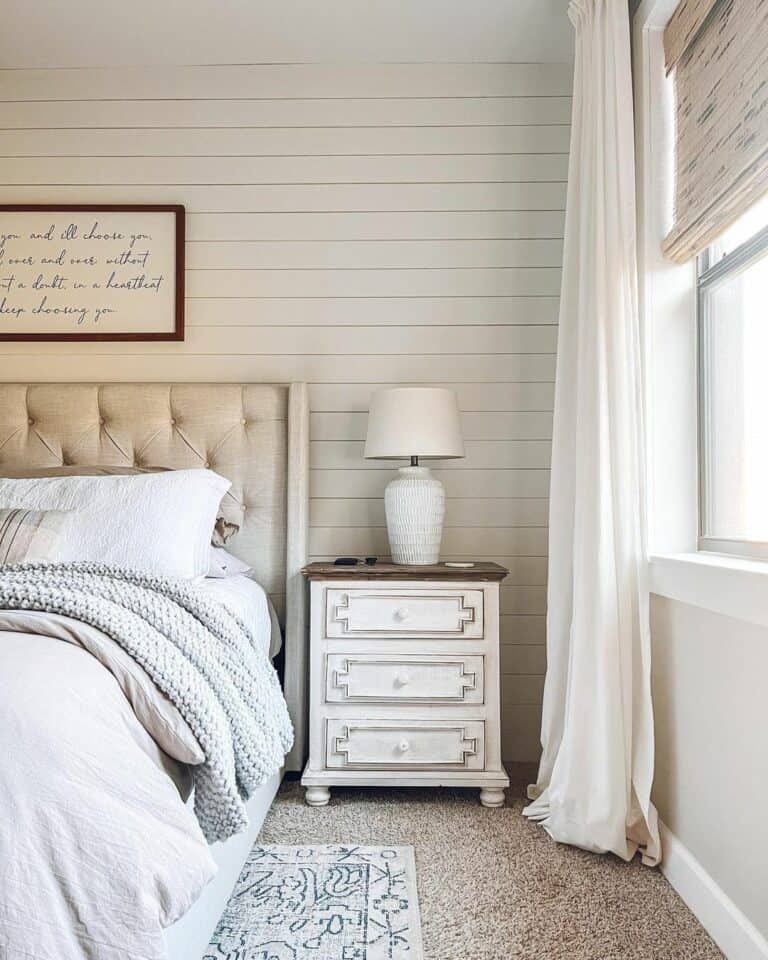 Farmhouse Bedroom With Two-toned White Nightstand