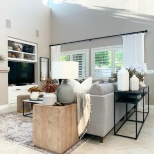 Farmhouse Living Room With Wooden End Table