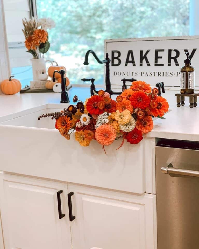 Farmhouse Sink Filled with Bright Flowers