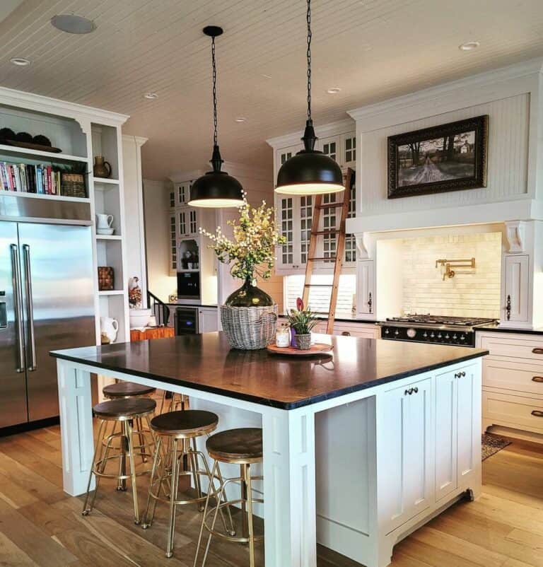 Farmhouse Style Kitchen With Beadboard Ceiling and Ladder Rail