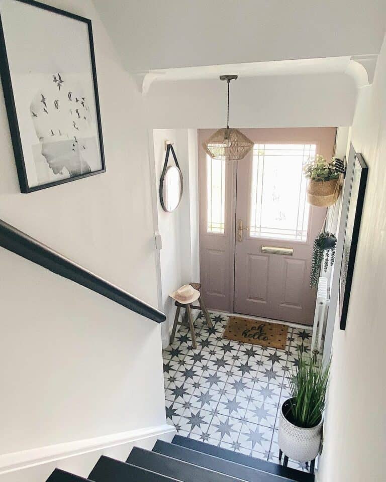 Foyer With White and Black Mosaic Floor Tiles