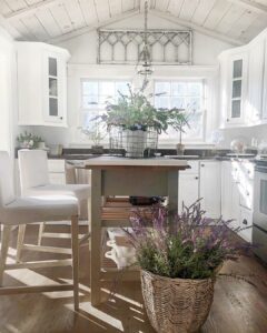 French Cottage Kitchen With a Rustic Pitched Ceiling