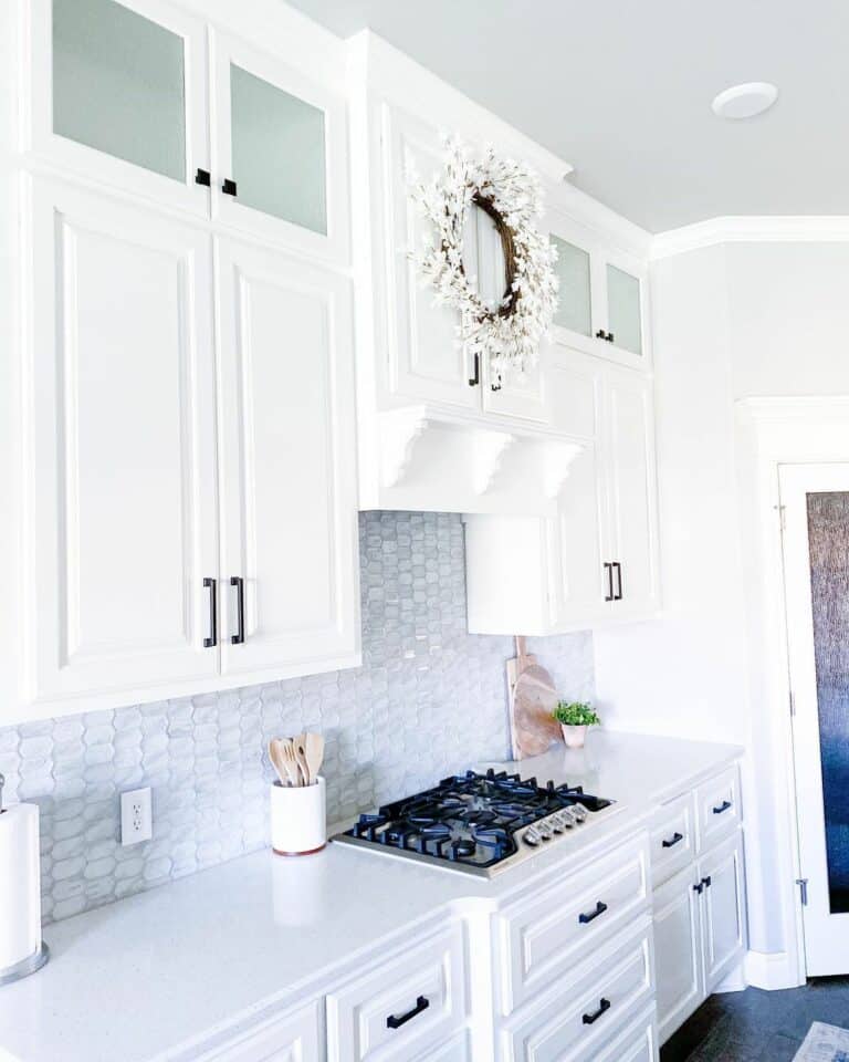 Geometric Scale Kitchen Backsplash With White Cabinetry