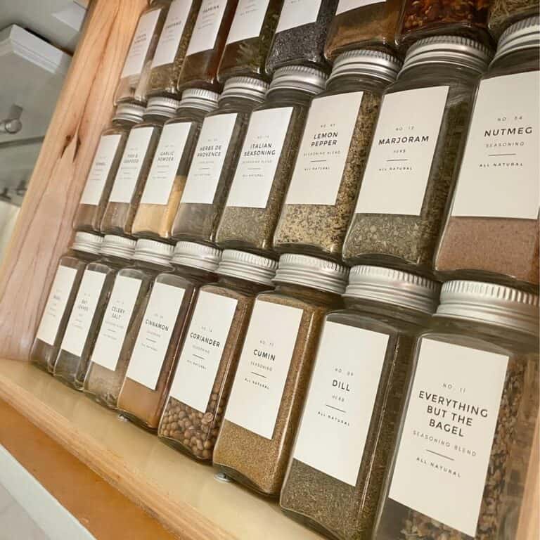 Glass Bottles Nestled in Wooden Drawer
