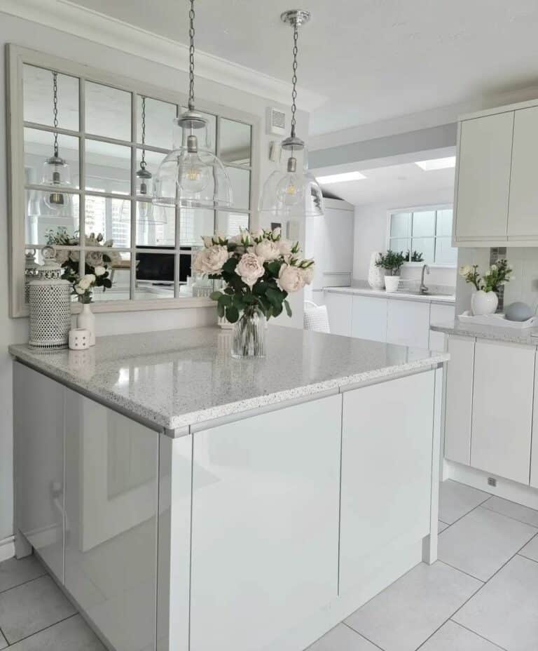 Gray Granite Kitchen Counters With Pale Pink Peonies