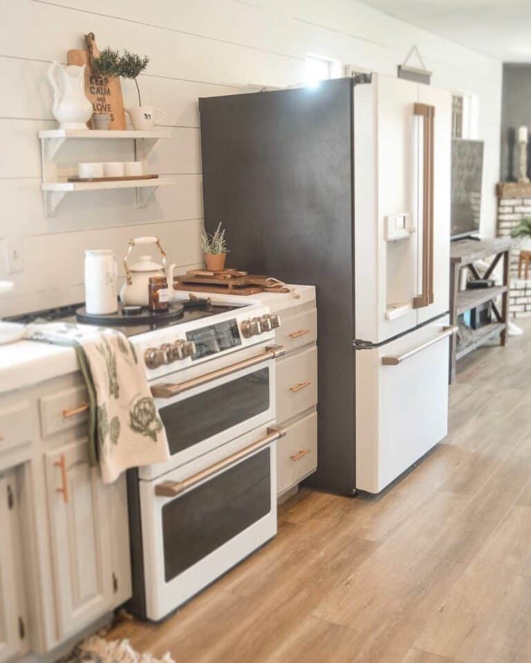 Gray Kitchen Cabinets With Black and White Appliances