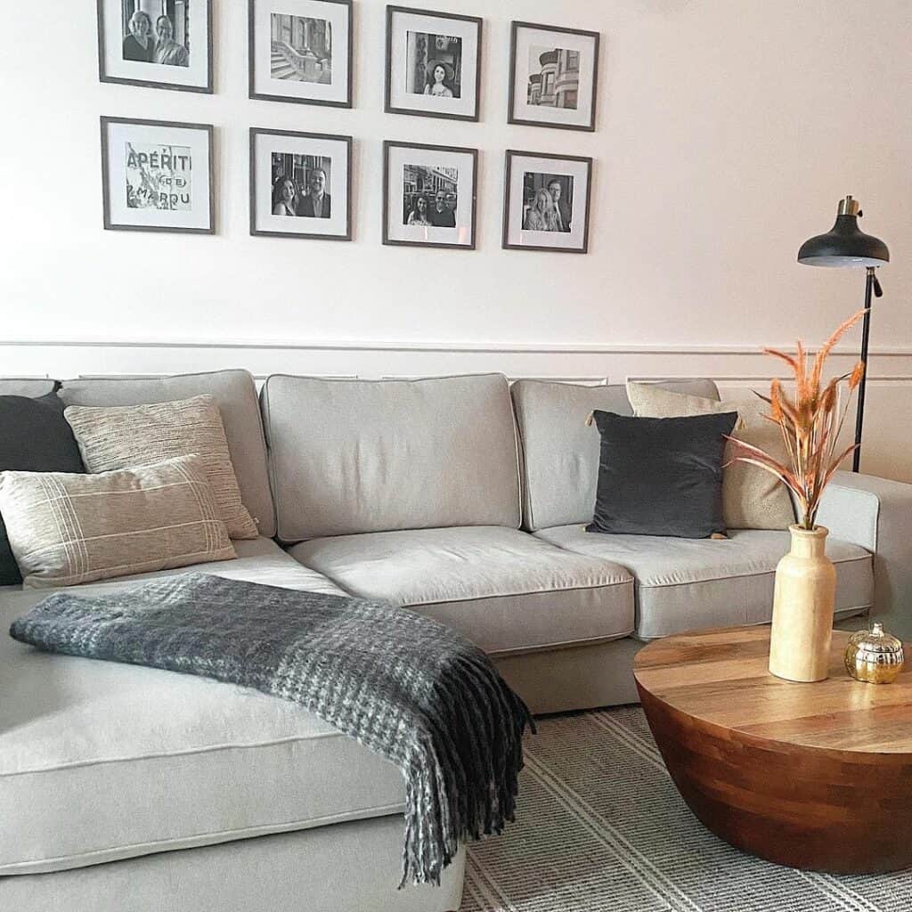 Gray Sectional With Wood Drum Coffee Table